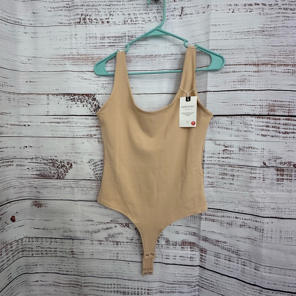 ADREAMLY tan bodysuit. Size medium. Still has tags on it.